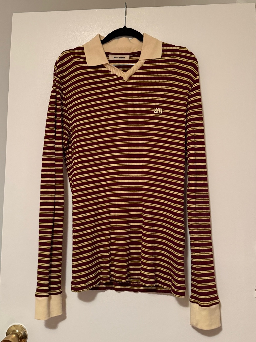 WALES BONNER Sonic striped ribbed-knit polo shirt